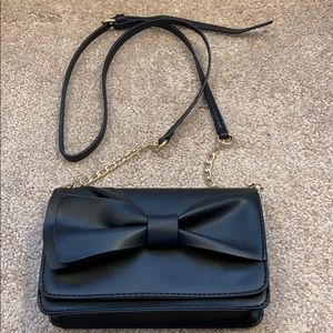 Black cross body bag bow detailing